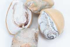 Seeds, 2026, hand-stitched and machine-sewn, specialty fabric, thread, adhesive bra cups, 6\" x 4\" x 2\" each — Photography by Mariah Richstone