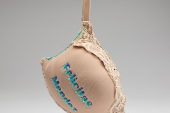 Detail of The Invisible Woman Syndrome installation, soft bra sculpture,  Felicitas Méndez, 2022, Thread, bra, synthetic filling, snaps, image credit:  form & concept and photographer credit: Byron Flesher